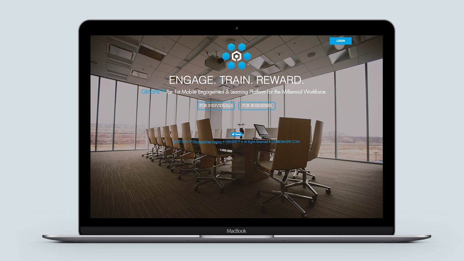 Screenshot of the Graspie homepage on a laptop