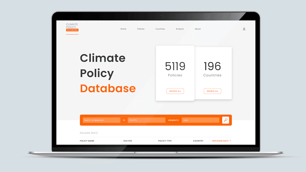 Screenshot of the Climate Policy Database homepage on a laptop