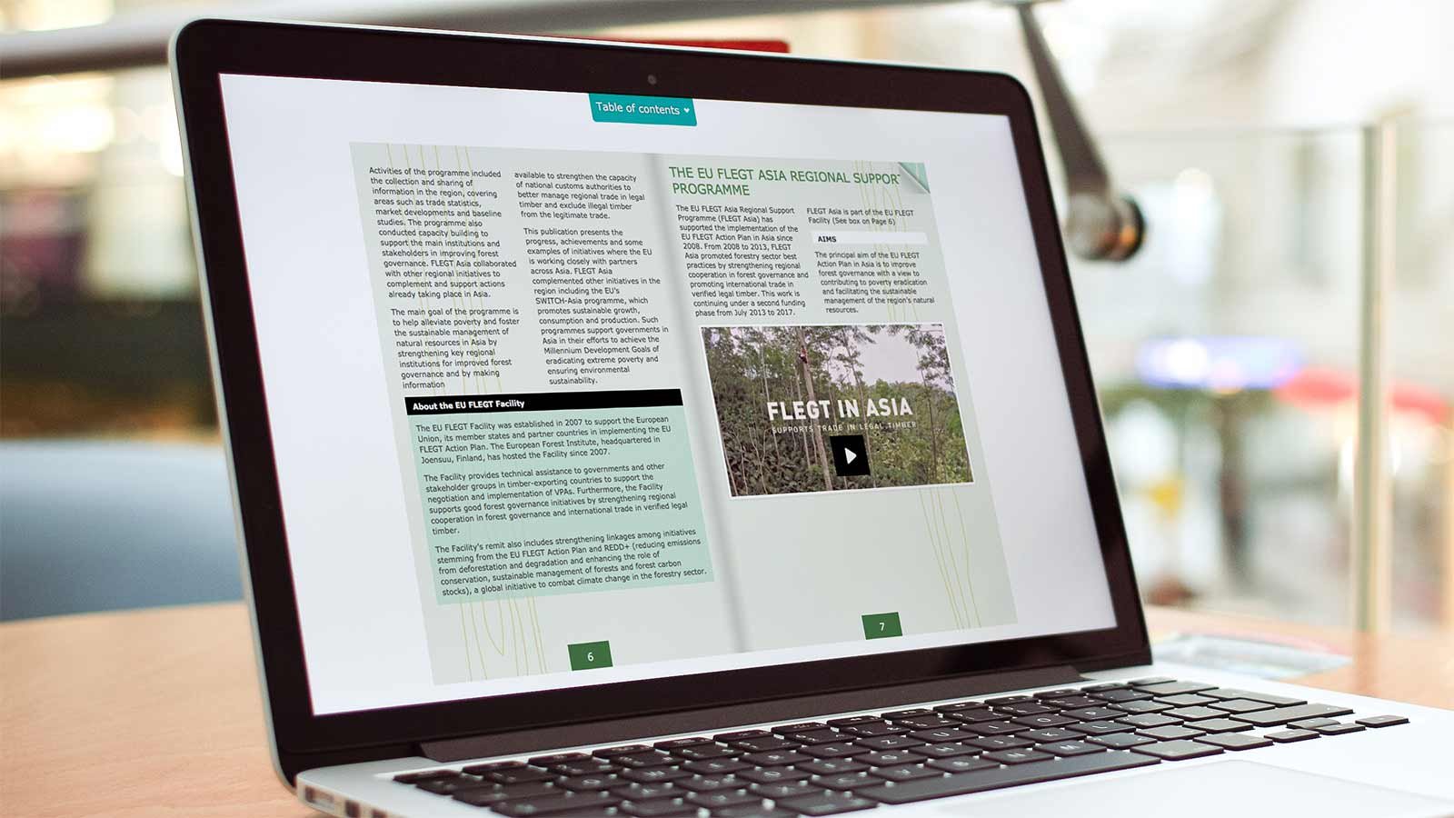 Screenshot of the FLEGT Asia - Flipbook homepage on a laptop